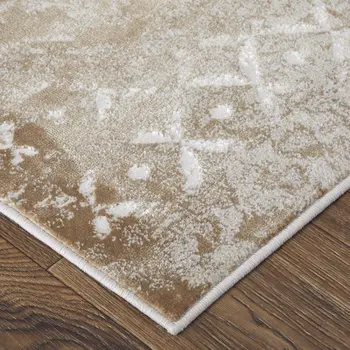 5' X 8' Tan and Ivory Abstract Power Loom Worn Faded Area Rug