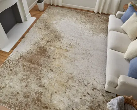 7' X 10' Tan and Ivory Abstract Power Loom Worn Faded Area Rug