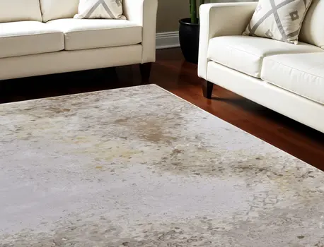 8' X 11' Tan and Ivory Abstract Power Loom Worn Faded Area Rug