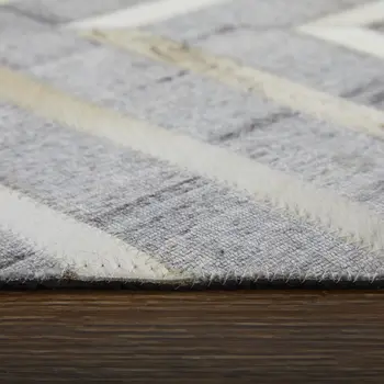 5' X 8' Gray and Ivory Geometric Hand Woven Area Rug