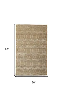 5' X 8' Tan and Ivory Geometric Hand Woven Area Rug