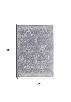 3' X 5' Gray and Blue Floral Power Loom Worn Faded Area Rug With Fringe