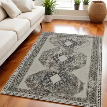 5' X 8' Gray and Ivory Abstract Power Loom Worn Faded Area Rug