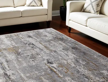 13' X 20' Gray Ivory and Gold Abstract Power Loom Area Rug With Fringe