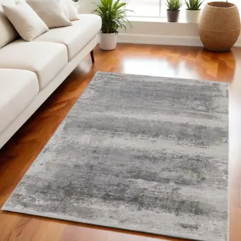 5' X 8' Gray Abstract Power Loom Area Rug With Fringe