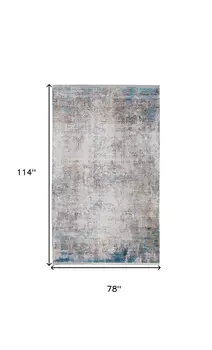 7' X 10' Ivory Gray and Blue Abstract Power Loom Area Rug With Fringe
