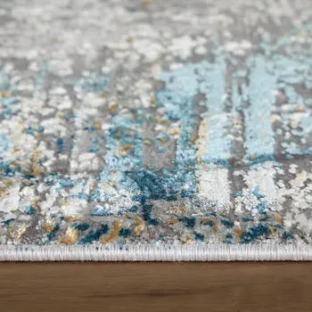 7' X 10' Ivory Gray and Blue Abstract Power Loom Area Rug With Fringe