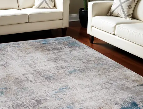 8' X 11' Ivory Gray and Blue Abstract Power Loom Area Rug With Fringe