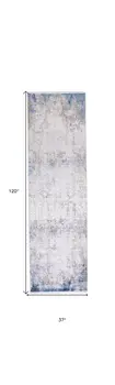 10' Ivory Gray and Blue Abstract Power Loom Runner Rug With Fringe