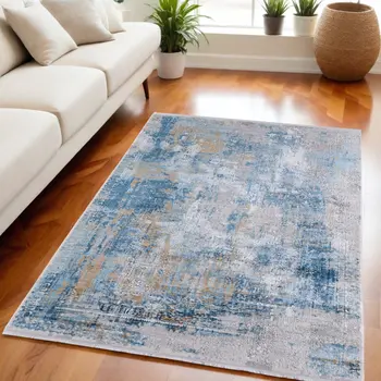 5' X 8' Blue Gold and Gray Abstract Power Loom Area Rug With Fringe