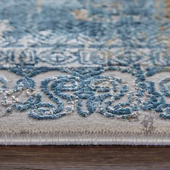 7' X 10' Blue Gold and Gray Abstract Power Loom Area Rug With Fringe