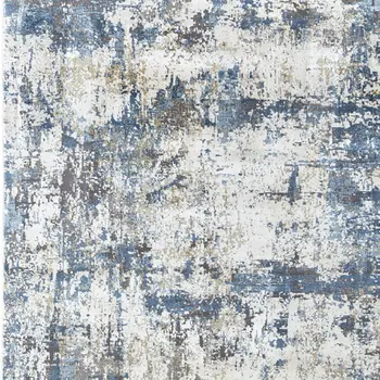 10' X 13' Ivory Tan and Blue Abstract Power Loom Area Rug With Fringe