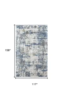 10' X 13' Ivory Tan and Blue Abstract Power Loom Area Rug With Fringe