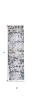 10' Ivory Tan and Blue Abstract Power Loom Runner Rug With Fringe
