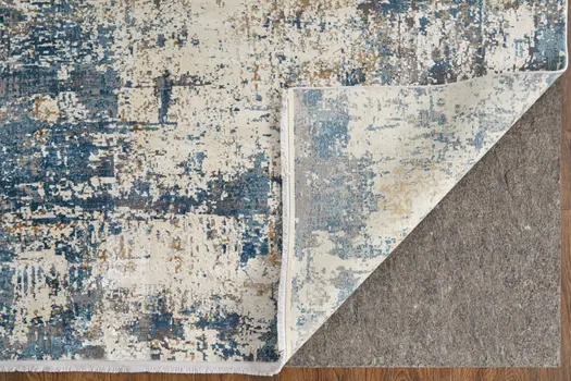13' X 20' Ivory Tan and Blue Abstract Power Loom Area Rug With Fringe