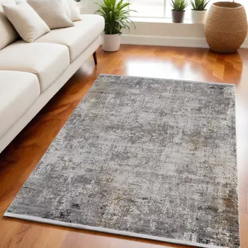 5' X 8' Ivory Taupe and Gray Abstract Power Loom Distressed Area Rug With Fringe