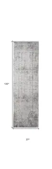 10' Ivory Taupe and Gray Abstract Power Loom Distressed Runner Rug With Fringe