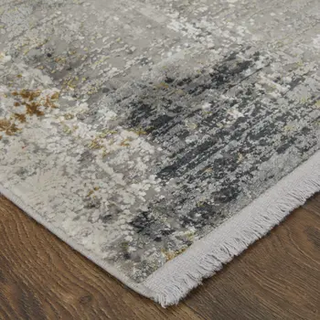 2' X 3' Ivory Taupe and Gray Abstract Power Loom Distressed Area Rug With Fringe