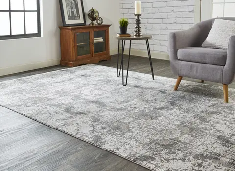 3' X 5' Ivory Taupe and Gray Abstract Power Loom Distressed Area Rug With Fringe
