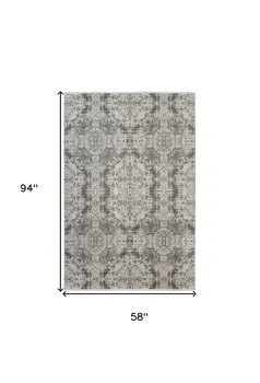 5' X 8' Ivory Taupe and Gray Abstract Power Loom Distressed Area Rug With Fringe