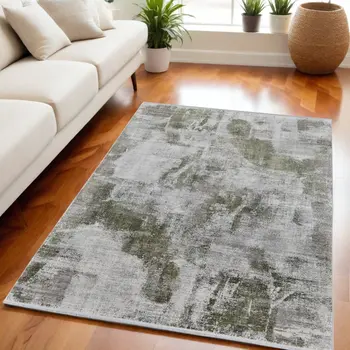 5' X 8' Gray Silver and Green Ikat Power Loom Area Rug With Fringe