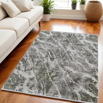 5' X 8' Taupe and Gray Abstract Power Loom Area Rug With Fringe