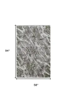 5' X 8' Taupe and Gray Abstract Power Loom Area Rug With Fringe