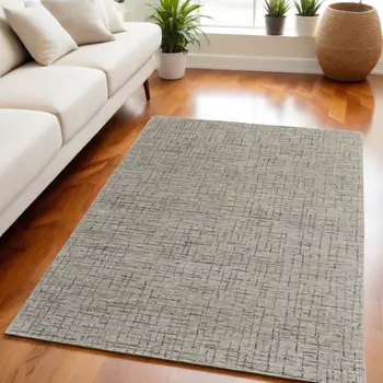 5' X 8' Ivory and Gray Wool Hand Tufted Distressed Area Rug