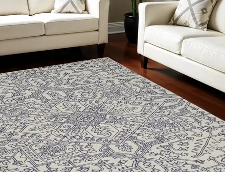 10' X 14' Ivory and Blue Wool Oriental Hand Tufted Area Rug