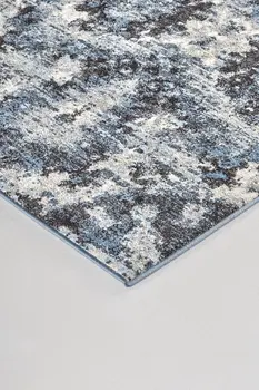 5' X 8' Blue Black and Ivory Ikat Power Loom Area Rug