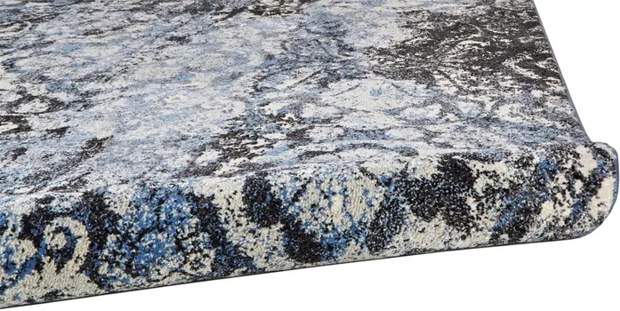 8' X 11' Blue Black and Ivory Abstract Power Loom Distressed Area Rug