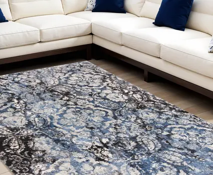 8' X 11' Blue Black and Ivory Abstract Power Loom Distressed Area Rug