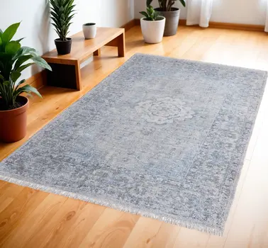 4' X 6' Gray Blue and Ivory Oriental Hand Woven Distressed Area Rug With Fringe