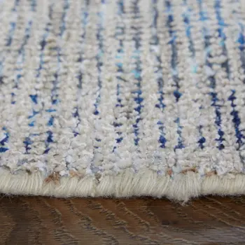 9' X 12' Gray Blue and Ivory Oriental Hand Woven Distressed Area Rug With Fringe