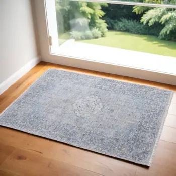 2' X 3' Gray Blue and Ivory Oriental Hand Woven Distressed Area Rug With Fringe