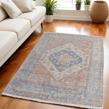 5' X 8' Red Blue and Ivory Abstract Hand Woven Distressed Area Rug With Fringe