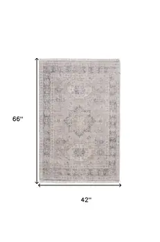 4' X 6' Tan and Gray Oriental Hand Woven Distressed Area Rug With Fringe