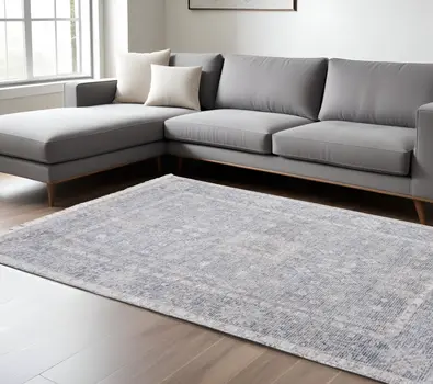 10' X 14' Gray Blue and Taupe Abstract Hand Woven Distressed Area Rug With Fringe