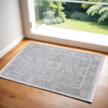 2' X 3' Gray Blue and Taupe Abstract Hand Woven Distressed Area Rug With Fringe