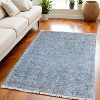 5' X 8' Blue and Gray Abstract Hand Woven Distressed Area Rug With Fringe