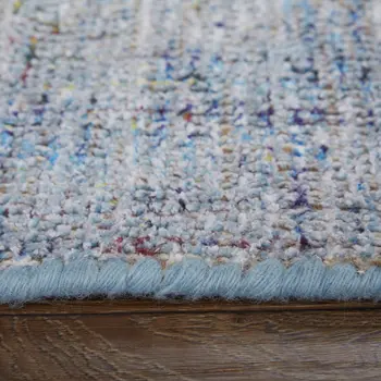 9' X 12' Blue and Ivory Abstract Hand Woven Distressed Area Rug With Fringe