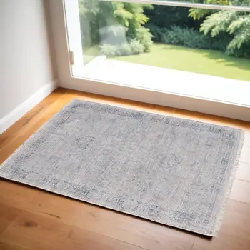 2' X 3' Gray Blue and Taupe Abstract Hand Woven Distressed Area Rug With Fringe
