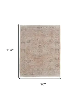 8' X 10' Tan Orange and Ivory Oriental Hand Woven Distressed Area Rug With Fringe