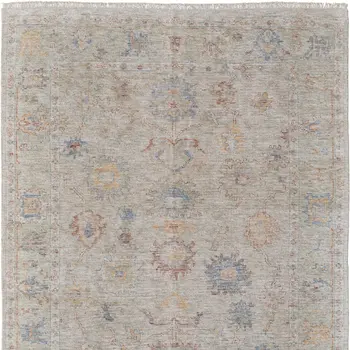 8' X 10' Tan Brown and Blue Floral Hand Woven Distressed Area Rug With Fringe