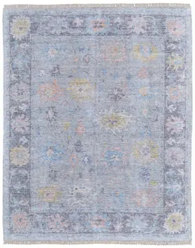 10' X 14' Orange Blue and Gold Floral Hand Woven Distressed Area Rug With Fringe