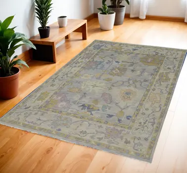 4' X 6' Purple Gray and Gold Wool Oriental Hand Knotted Area Rug With Fringe