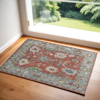 9' X 13' Gray Red and Ivory Wool Floral Hand Knotted Area Rug With Fringe