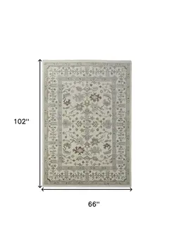 6' X 9' Ivory Gray and Brown Wool Floral Hand Knotted Area Rug With Fringe