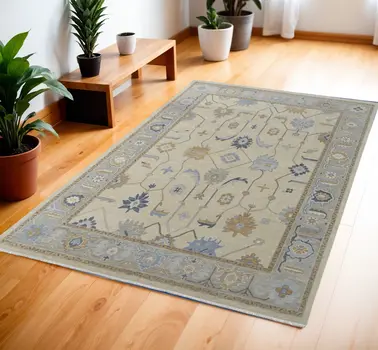 4' X 6' Gray Ivory and Blue Wool Floral Hand Knotted Area Rug With Fringe