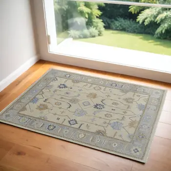 2' X 3' Gray Ivory and Blue Wool Floral Hand Knotted Area Rug With Fringe